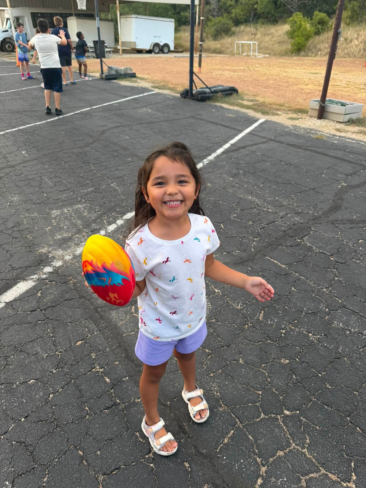 Girl enjoying an outdoor ministry activity