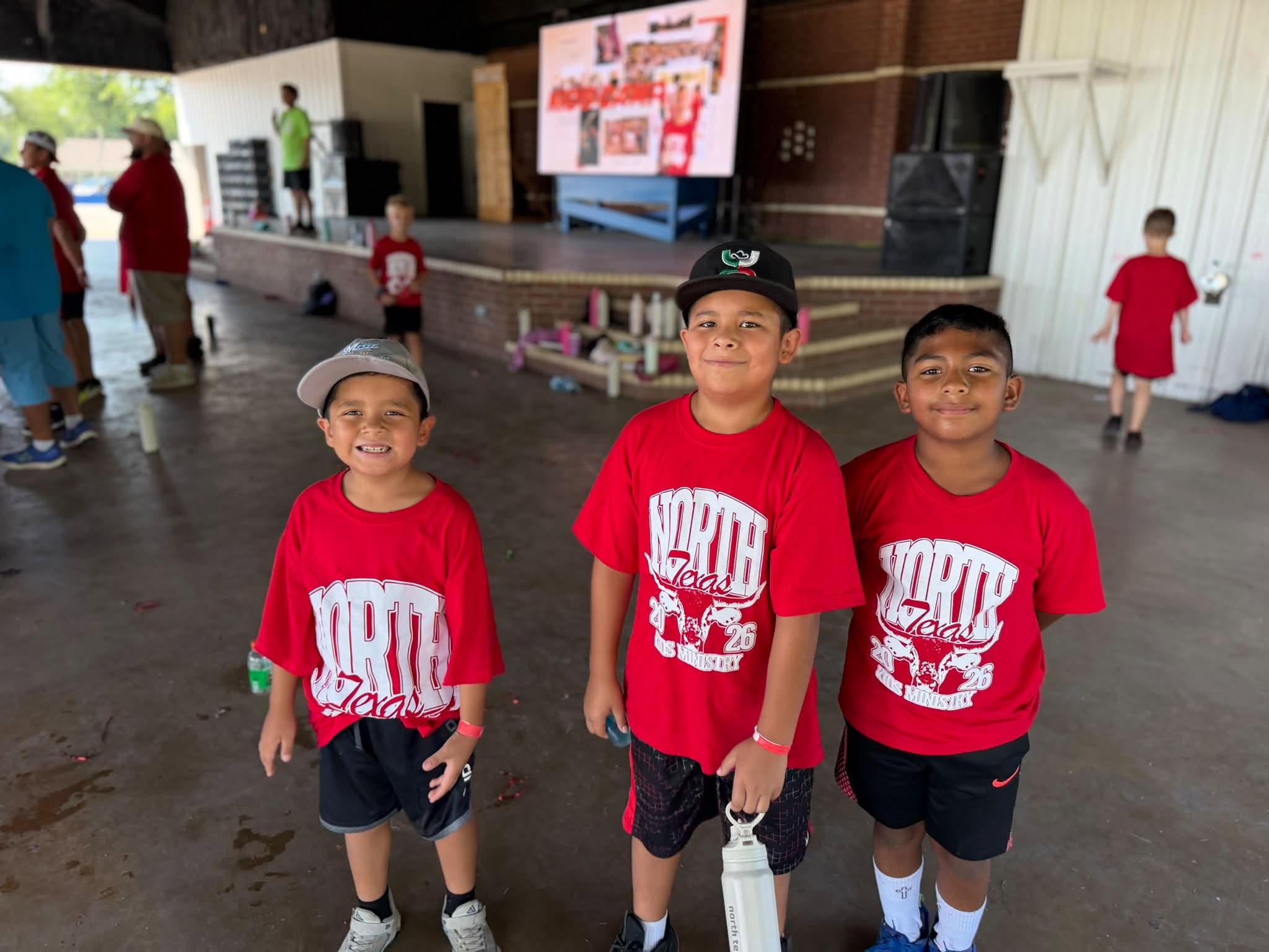 Three boys together at a ministry event
